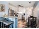 A modern kitchen featuring stainless steel appliances, granite countertops, and breakfast bar seating at 5601 N Ocean Blvd. # E-113, Myrtle Beach, SC 29577