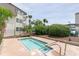 Community kiddie pool surrounded by tropical landscaping and near the condo building at 5601 N Ocean Blvd. # E-113, Myrtle Beach, SC 29577