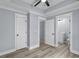 Bedroom with tray ceiling and doors to closet, bathroom, and bedroom entry at 6001-Mh13A S Kings Hwy., Myrtle Beach, SC 29575
