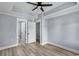 Spacious bedroom showing closet and bathroom access and a ceiling fan at 6001-Mh13A S Kings Hwy., Myrtle Beach, SC 29575