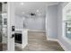Bright living room with modern finishes, including beautiful floors and recessed lighting at 6001-Mh13A S Kings Hwy., Myrtle Beach, SC 29575