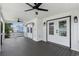 View of the spacious outdoor patio with wood floors, ceiling fans, and access to the main house at 6001-Mh13A S Kings Hwy., Myrtle Beach, SC 29575