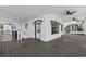 Spacious covered porch with ceiling fans provides a comfortable outdoor living space at 6001-Mh13A S Kings Hwy., Myrtle Beach, SC 29575