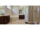 Lovely primary bath with double sink vanity, separate shower and tub and tile floors at 6400 Longwood Dr., Murrells Inlet, SC 29576