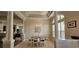 Bright dining room featuring large windows, tile flooring, and an open layout at 6400 Longwood Dr., Murrells Inlet, SC 29576