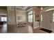 Elegant dining room with coffered ceilings, tile flooring, and ample natural light at 6400 Longwood Dr., Murrells Inlet, SC 29576