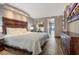 Comfortable bedroom featuring king bed, dresser, and modern decor at 6900 N Ocean Blvd. # 842, Myrtle Beach, SC 29577