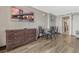 Functional dining area with table and four chairs, dresser with large flatscreen TV for entertainment at 6900 N Ocean Blvd. # 842, Myrtle Beach, SC 29577