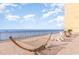 Relaxing outdoor lounge deck furnished with hammocks and chairs, offering stunning ocean views at 6900 N Ocean Blvd. # 842, Myrtle Beach, SC 29577
