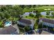 Aerial view of the property showcasing a sparkling pool, well-maintained grounds, and ample parking at 695 Riverwalk Dr. # 101, Myrtle Beach, SC 29579