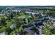 Stunning aerial view of waterfront condos, a lush golf course and meticulously landscaped grounds at 695 Riverwalk Dr. # 101, Myrtle Beach, SC 29579