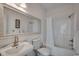 Bathroom with white vanity, gold faucet, and shower/tub combo at 695 Riverwalk Dr. # 101, Myrtle Beach, SC 29579