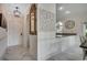 Inviting entryway featuring marble floors, decorative mirror, pendant lighting, and dining area view at 695 Riverwalk Dr. # 101, Myrtle Beach, SC 29579