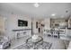 Spacious living area flowing to dining space with marble flooring and stylish furnishings at 695 Riverwalk Dr. # 101, Myrtle Beach, SC 29579