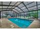 Bright indoor pool area featuring clear blue water, natural lighting, and comfortable poolside seating at 695 Riverwalk Dr. # 101, Myrtle Beach, SC 29579