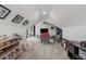Bright attic showcasing neutral carpeting, vaulted ceilings, fan, and inviting decor at 752 Hobonny Loop, Longs, SC 29568