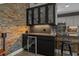 Stylish bar area featuring granite countertops, wine cooler and convenient seating at 752 Hobonny Loop, Longs, SC 29568