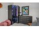 Well-organized closet with a lighted cabinet and drawers, situated beside modern decor at 752 Hobonny Loop, Longs, SC 29568