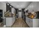 Contemporary kitchen with gray cabinets, granite countertops, stainless steel appliances, and wood-look floors at 752 Hobonny Loop, Longs, SC 29568