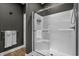 Modern walk-in shower with glass door and tile surround at 752 Hobonny Loop, Longs, SC 29568
