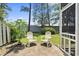 Enjoy this backyard featuring a patio area, green grass, a privacy fence, and mature landscaping at 81 Shadow Moss Pl. # 81, North Myrtle Beach, SC 29582