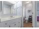 A bathroom features a vanity, a toilet, and a mirror creating a clean and functional space at 81 Shadow Moss Pl. # 81, North Myrtle Beach, SC 29582
