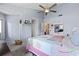 Serene bedroom with soft blue walls, carpeted floors, ceiling fan and a relaxing coastal ambiance at 81 Shadow Moss Pl. # 81, North Myrtle Beach, SC 29582