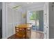 Bright breakfast nook with a wood table, patio access, and extra storage at 81 Shadow Moss Pl. # 81, North Myrtle Beach, SC 29582
