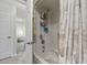 Clean shower with curtain and caddy for organized bathing at 81 Shadow Moss Pl. # 81, North Myrtle Beach, SC 29582