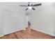 Light and airy room with wood floors and closet featuring bright white doors at 83 Reef Run Rd., Pawleys Island, SC 29585