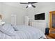 Spacious bedroom featuring wood-look floors and an adjacent seating area at 83 Reef Run Rd., Pawleys Island, SC 29585