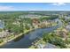 Stunning aerial view of home with beautiful lake frontage at 904 Kalmia Ct., Myrtle Beach, SC 29579