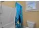 Bathroom boasts a shower with a themed curtain and a standard toilet at 904 Kalmia Ct., Myrtle Beach, SC 29579