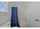 Bathroom featuring a bathtub with shower and a blue shower curtain at 904 Kalmia Ct., Myrtle Beach, SC 29579