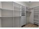 Walk-in closet boasts built-in shelving and drawers at 904 Kalmia Ct., Myrtle Beach, SC 29579