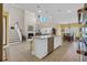 Open kitchen with island, view of the living room, and dining area at 932 Abernathy Place, Surfside Beach, SC 29575