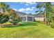 Relaxing backyard with a screened-in porch and well-maintained lawn at 1009 Maccoa Dr., Conway, SC 29526