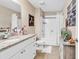 Clean bathroom with granite counters, tile floor, shower, and plants providing a spa-like ambiance at 1009 Maccoa Dr., Conway, SC 29526
