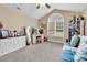 Comfortable bedroom area with large window, ceiling fan, decorations and seating at 1009 Maccoa Dr., Conway, SC 29526