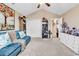 Cozy bedroom area featuring a comfortable couch, decorations, and shoe storage at 1009 Maccoa Dr., Conway, SC 29526