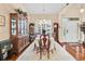 Spacious dining room with a tall grandfather clock and elegant furnishings at 1009 Maccoa Dr., Conway, SC 29526