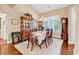 Beautiful dining room featuring a large window, wood floors, and decorative accents at 1009 Maccoa Dr., Conway, SC 29526