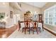 Elegant dining room with a high ceiling, large window, and traditional furniture at 1009 Maccoa Dr., Conway, SC 29526