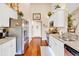 Bright kitchen featuring white cabinets, stainless steel appliances, and a long view at 1009 Maccoa Dr., Conway, SC 29526
