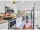 Modern kitchen with stainless steel appliances, granite countertops, and ample lighting at 1009 Maccoa Dr., Conway, SC 29526