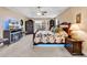 Relaxing main bedroom featuring a fireplace and large bed with a unique, lighted bedframe at 1009 Maccoa Dr., Conway, SC 29526