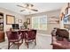Well-lit office space with desk, chairs, and printer; ideal for productivity at 1009 Maccoa Dr., Conway, SC 29526