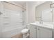 Clean bathroom with single sink vanity and shower-tub combination at 1016 Laurens Mill Dr., Myrtle Beach, SC 29579