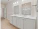 Bright bathroom with double sink vanity, tile floor and a glass enclosed shower at 1016 Laurens Mill Dr., Myrtle Beach, SC 29579