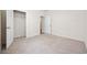Bright bedroom features neutral carpet, closet, and an ensuite doorway at 1016 Laurens Mill Dr., Myrtle Beach, SC 29579